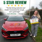 Newly qualified driver celebrating success in Halifax test centre