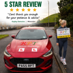 Excited driver giving thumbs up after Halifax driving test pass